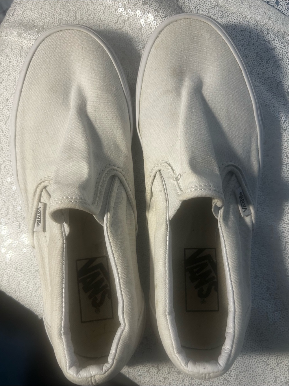 Vans  Classic Slip-On Sneakers in White. Signs of wear as shown and priced